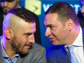 Boxing promoter Camille Estephan, right, is seen with boxer David Lemieux, left, during a press conference in Montreal on Wednesday, March 9, 2016.
