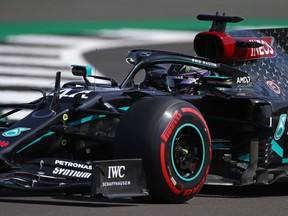 Mercedes' British driver Lewis Hamilton during the third practice session of the F1 70th Anniversary Grand Prix at Silverstone on August 8, 2020 in Northampton. - This weekend's race will commemorate the 70th anniversary of the inaugural world championship race, held at Silverstone in 1950.