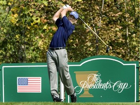 Mike Weir tees off during the final round of the 2007 Presidents Cup at the Royal Montreal Golf Club in September 2007. Weir beat Tiger Woods 1 up.