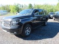 A 2018 Chevy Suburban is listed for sale on the GC Surplus website.