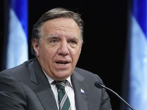"In the last six months we went through a roller-coaster of emotion," says Premier François Legault, seen in a file photo.