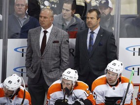 Flyers head coach Alain Vigneault, right, and assistant Michel Therrien are both former head coaches of the Canadiens. The teams begin their playoff series on Wednesday.