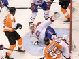 Canadiens goalie Carey Price sprawls to make one of his 30 saves in 5-0 win over the Philadelphia Flyers in Game 2 of the first-round NHL playoff series at Toronto’s Scotiabank Arena.