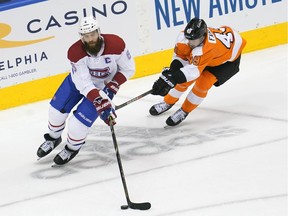 Montreal Canadiens defenseman Shea Weber (6) moves the puck against Philadelphia Flyers left wing Joel Farabee (49) during the third period in Game 5 of the first round of the 2020 Stanley Cup Playoffs.
