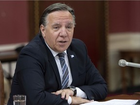 "The leader of the opposition is trying to rewrite history," Premier François Legault said during a tense exchange at the annual review of budget spending before a committee of the legislature on Wednesday.