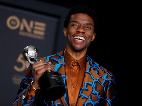 Los Angeles, California, U.S., March 30, 2019 – Chadwick Boseman poses backstage with his Outstanding Actor in a Motion Picture award for Black Panther.