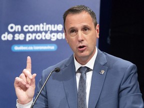 Quebec Education Minister Jean-Francois Roberge unveils an updated back-to-school plan for the 2020-2021 school year at a news conference in Montreal, Monday, August 10, 2020.