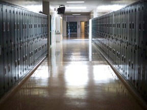 A empty hallway is seen at McGee Secondary school in Vancouver, on Sept. 5, 2014.