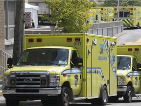 Ambulances wait outside the Notre-Dame hospital, on Tuesday August 25, 2020.