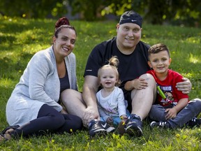 Raffaele Spera Jr. with his wife, Cristina Bilbao, and children Damiano and Ariana at a park near their home in Montreal on Saturday, Sept. 5, 2020. Spera, a former offensive lineman with McGill University, is fighting leukemia and has been told he has six months to live.
