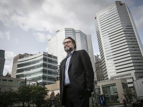 David Heurtel, former Quebec minister of environment and immigration, is seen outside his downtown office on Monday, Sept. 14, 2020.