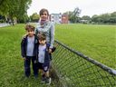 Karolina Weclas and other parents were upset at the prospect of the field next to Dunrae Gardens Elementary School — which is used as a schoolyard by the T.M.R. institution — being the site of a new French school. “We wanted to make sure that a decision wasn’t being made and we were the last ones to find out,” says Weclas, with sons Marcus, left, and Samuel.
