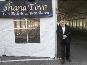 Rabbi Reuben Poupko of Beth Israel Beth Aaron Congregation in Côte-St-Luc stands next to the tent where worshippers can gather while respecting safe-distance protocols.