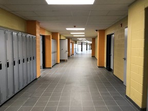 The empty hallway of a school.