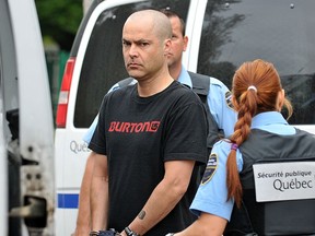 Éric Lefebvre is seen being arrested in Chicoutimi in 2013. A few weeks ago, he automatically qualified for a statutory release on the six-year sentence he received in 2016. Within days, Lefebvre is alleged to have robbed three banks and a jewelry store in Montreal.