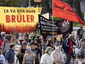 People march on René-Lévesque Blvd. to protest against the lack of action on climate change in Montreal on Saturday, Sept. 26, 2020.