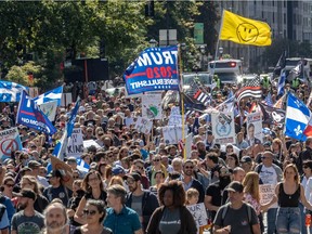 Demonstrators protested peacefully against the Quebec government's mandatory mask law in Montreal on Saturday September 12, 2020.