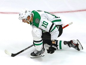 Corey Perry of the Dallas Stars celebrates after scoring the game-winning goal against the Tampa Bay Lightning during the second overtime period to give the Stars the 3-2 victory in Game 5 of the 2020 NHL Stanley Cup Final at Rogers Place on Sept. 26, 2020.