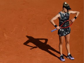 Canada's Eugenie Bouchard reacts as she plays against Ukraine's Lesia Tsurenko during their women's singles first round match on day three of The Roland Garros 2019 French Open tennis tournament in Paris on May 28, 2019.