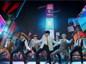 This handout image released courtesy of MTV shows South Korean boy band BTS performing from South Korea during the 2020 MTV Video Music Awards, being held virtually amid the coronavirus pandemic, broadcast on August 30, 2020 in New York. (Photo by - / MTV / AFP) / RESTRICTED TO EDITORIAL USE - MANDATORY CREDIT "AFP PHOTO / MTV " - NO MARKETING - NO ADVERTISING CAMPAIGNS - DISTRIBUTED AS A SERVICE TO CLIENTS