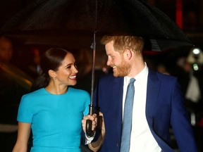 Britain's Prince Harry and his wife Meghan, Duchess of Sussex, arrive at the Endeavour Fund Awards in London, Britain March 5, 2020. REUTERS/Hannah McKay/File Photo