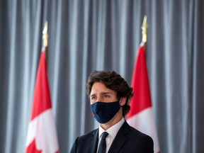Canada's Prime Minister Justin Trudeau looks on before unveiling plans for post-coronavirus recovery for Black owned business and entrepreneurs in Toronto, Ontario, Canada September 9, 2020. REUTERS/Carlos Osorio