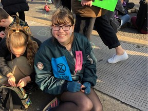 Teen climate activist Blue Sandford, author of the book "Challenge Everything", attends the Extinction Rebellion occupation of Blackfriars Bridge in London, Britain, in this handout picture taken November 17, 2018. Courtesy Roc Sandford/via REUTERS THIS IMAGE HAS BEEN SUPPLIED BY A THIRD PARTY. MANDATORY CREDIT. NO RESALES. NO ARCHIVES. NO USE AFTER OCTOBER 7, 2020.