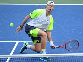 Denis Shapovalov hits a volley against Taylor Fritz on Day 5 of the 2020 U.S. Open at USTA Billie Jean King National Tennis Center in Flushing Meadows, N.Y., on Friday, Sept. 4, 2020.