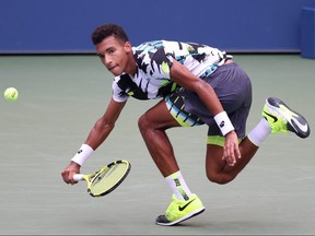 Felix Auger-Aliassime of Canada returns the ball against Dominic Thiem during the 2020 U.S. Open at the USTA Billie Jean King National Tennis Center on September 7, 2020 in New York.