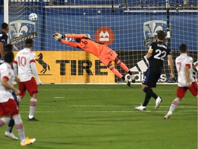 Montreal Impact goalkeeper Clément Diop (23) makes a save against Toronto FC during the first half at Saputo Stadium on Wednesday, Sept. 9.