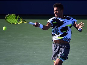 Felix Auger-Aliassime of Canada hits the ball against Corentin Moutet of France on day six of the 2020 U.S. Open tennis tournament at USTA Billie Jean King National Tennis Center. Mandatory Credit: Robert Deutsch-USA TODAY Sports