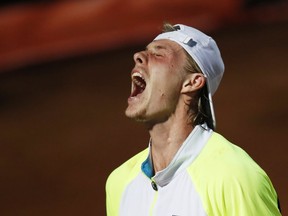 Canada's Denis Shapovalov reacts during his quarter-final against Bulgaria's Grigor Dimitrov at the Italian Open in Rome on Saturday, Sept. 19, 2020.