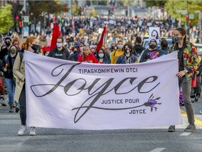 "Justice for Joyce Echaquan" demonstration heads south on Berri St. in Montreal on Saturday.