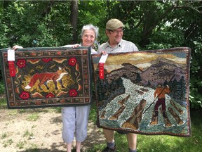 Isabelle Rollin and Jacques Lepage hold up some rugs they made as members of the Beaconsfield Hooking Crafters Guild. Due to the COVID-19 pandemic, the crafters are holding a virtual exhibition this year. Visit their website at beaconsfieldrughooking.com/45-years/ or check their Facebook page at https://www.facebook.com/beaconsfield.hookingcrafters https://or Instagram account at www.instagram.com/bhcg_rughooking/.