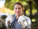 Boxer and nurse Kim Clavell has been named one of Time Magazine's Next Generation Leaders, a twice-yearly selection of rising stars in politics, technology, culture, science, sports and business. Cloves with gloves and scrubs outside his home in Montreal on Sunday, October 11, 2020.