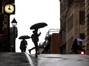 Time seems to stand still on rainy days in Old Montreal on Monday, October 19, 2020.