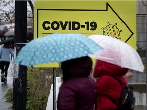 People leave the Jewish General Hospital's COVID-19 testing area on Oct. 19, 2020.