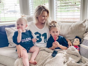 Angela Price, the wife of Canadiens goalie Carey Price, gets ready to cheer him on along with their daughters Liv, 4, and Millie, 1, from her parents' home in Kennewick, Wash., during 2020 NHL playoffs.