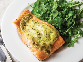 You can use store-bought pesto for this roast salmon recipe, or you can make your own.