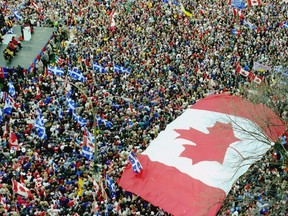 A huge Canadian flag marks the "love-in" rally in support of Canadian unity in downtown Montreal on Oct. 27, 1995, three days before the Quebec referendum.
