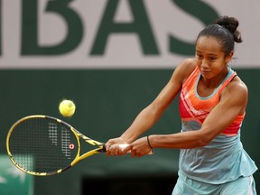 Leylah Fernandez of Montreal plays a backhand during her Women's Singles third round match against Petra Kvitova of Czech Republic on day seven of the 2020 French Open at Roland Garros on Saturday, Oct. 3, 2020, in Paris.