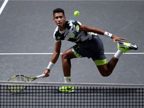 Félix Auger-Aliassime of Montreral plays a forehand during the match between Henri Laaksonen of Switzerland and Felix Auger-Aliassime of Canada of day four of the Bett1Hulks Indoor tennis tournament at Lanxess Arena on Thursday, Oct. 15, 2020, in Cologne, Germany.