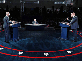 U.S. President Donald Trump, right, and Democratic presidential candidate Joe Biden take part in the first 2020 presidential debate in Cleveland, Ohio, on September 29, 2020.