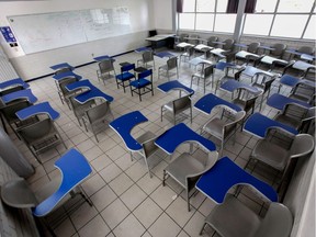 Picture of an empty classroom at the University Centre for Economic-Administrative Sciences (CUCEA) of the University of Guadalajara (UAG), in Guadalajara, Jalisco State, Mexico, taken on March 17, 2020 after classes at all levels in Mexico were suspended for an indefinite period as a precautionary measure against the spread of the new coronavirus, COVID-19. - Quarantine, schools, shops and borders closed, gatherings banned, are the main measures being taken in many countries across the world to fight the spread of the novel coronavirus. (Photo by Ulises Ruiz / AFP)