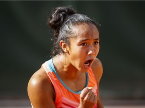 Laval's Leylah Annie Fernandez celebrates after winning a point against Slovenia's Polona Hercog during their second-round match at the French Open in Paris on Oct. 1, 2020.