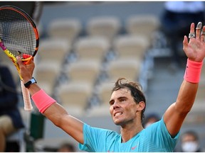 Spain's Rafael Nadal celebrates after winning against Argentina's Diego Schwartzman during their men's singles semi-final tennis match on Day 13 of The Roland Garros 2020 French Open tennis tournament in Paris on Friday, Oct. 9, 2020.