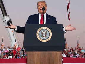 US President Donald Trump holds a Make America Great Again rally as he campaigns at Orlando Sanford International Airport in Sanford, Florida, October 12, 2020.