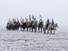 Men dressed as 1812-era French soldiers take part in a staged battle near the Belarus village of Bryli, about 115 kilometres east of the capital, Minsk, Sunday, Nov. 25, 2018, to mark the 206th anniversary of the Berezina battle during Napoleon's army retreat from Russia. An epidemic of typhus among Napoleon's forces prompted the retreat, Joe Schwarcz writes.