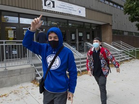 CP-Web. Students from Lasalle Community Comprehensive High School walk out of class to protest COVID-19 safety concerns Thursday, October 1, 2020 in Montreal.
