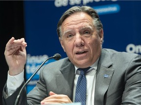 Twenty-eight days was not enough to stop the spread of COVID-19 in Quebec, says Premier François Legault, seen in a fie photo.